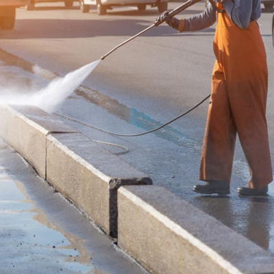 Day Porter Powerwashing Curb