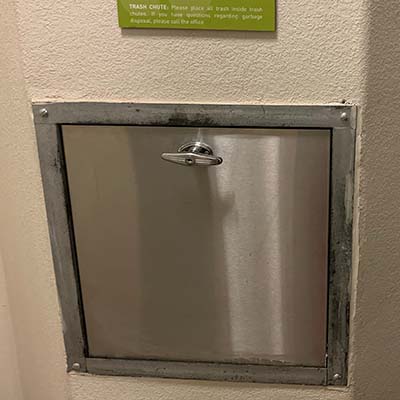 installing a trash chute built-in cleaning systems power washing